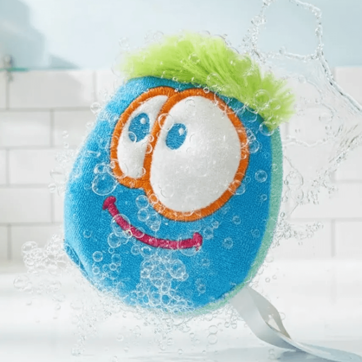 Esponja Rígida, Divertida Baño. Doble Textura, Carita Feliz Azul - ttaiomayoreo